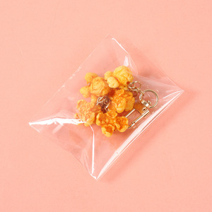 Porte-clés en forme de pop-corn simulé, jouet alimentaire amusant pour sac, pendentif décoratif imitation nourriture - Product Image 4