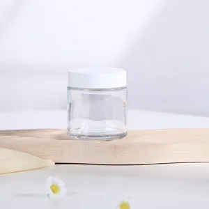 Commercio all'ingrosso di cosmetici di lusso 100ml di vetro vuoto elegante vasetto di crema con coperchio di plastica