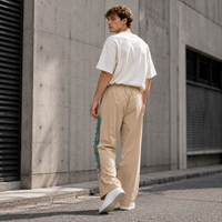 Pantalon de survêtement personnalisé pour homme, bleu et orange contrastés, en nylon léger, coupe large, avec ourlet réglable à cordon, pantalon de sport athlétique