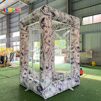 Cabine gonflable personnalisée en forme de dollar américain pour attraper l'argent, cube attrape-argent gonflable résistant au vent pour jeux publicitaires et événements festifs