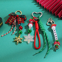 Oferta Especial de Navidad: Nuevo y Popular Llavero de Bolsa Tejido a Mano con Dijes Exquisitos de Lazo y Copo de Nieve, Adorno Navideño