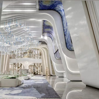 Lustre ANNO Blue Drop avec design flottant multi-niveaux, suspension personnalisée en grappe pour centre de vente immobilière