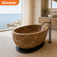 Baignoire ovale autoportante en marbre brun veiné blanc, base foncée polie, pour salle de bain moderne et luxueuse