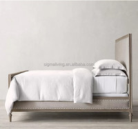 Lit plateforme king-size en bois massif capitonné, mobilier de chambre sur mesure