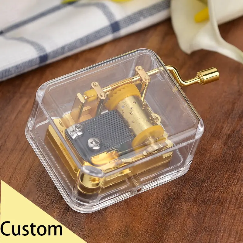 Immer helle Mini Acryl Handkurbel Spieluhr Runde Herz quadratische Form Mini Spieluhr mit Metall Gold Wind Up Musci Box Bewegung
