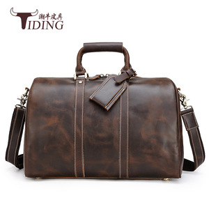 Bolso de viaje de cuero Crazy Horse para hombre de Tiding, gran capacidad, 56-75L, color sólido, para viajes de ocio. - Product Image 1
