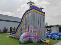 Toboggan aquatique gonflable en forme de palmier tropical avec deux pistes et piscine à jets pour les fêtes d'été