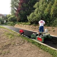 Machine de pavage routier TPJ-2.5 entièrement automatique et hydraulique pour la pose de granulats de caoutchouc, à vendre