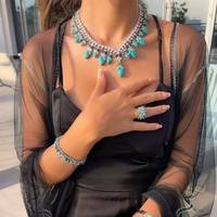 Ensemble de bijoux de luxe 4 pièces en zircon pour femme : collier, boucles d'oreilles, bracelet et bague – Style raffiné pour mariage et soirée
