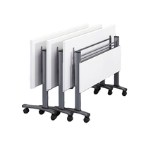 Bureau d'écriture modulaire moderne, élégant et fonctionnel, avec panneaux et roulettes incluses pour un gain de place, idéal pour l'école, le bureau ou la salle de formation.