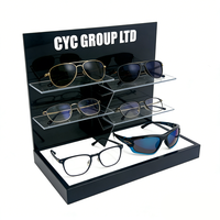 Présentoir à lunettes OEM en acrylique noir pour magasins de lunettes et vitrines de vente au détail