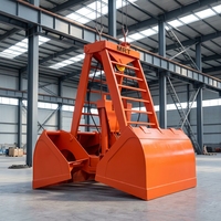 Grappin hydraulique autonome à batterie pour la manutention de minerai de fer, de charbon, de coke et de marchandises en vrac, avec télécommande sans fil