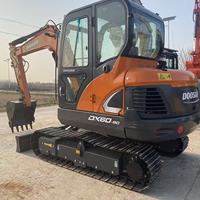 Mini-excavatrice hydraulique sur chenilles Doosan DX60 d'occasion, bien entretenue, prête à être expédiée sur les marchés mondiaux