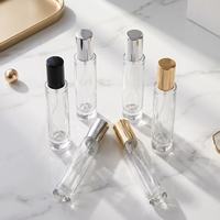 Flacon de parfum cylindrique en verre personnalisé OEM ODM avec logo, 10ml 15ml, atomiseur rechargeable, bouchon en aluminium, carton gratuit, vente en gros directe usine