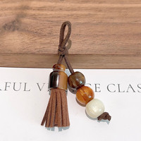 Breloques de chaussures perlées pour bottes Martin et baskets, clips de chaussures en cuir à pompons avec perles d'ambre, accessoires de chaussures bohèmes vintage