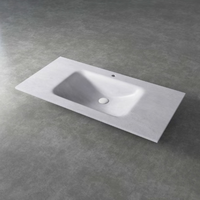 Ensemble de meuble-lavabo mural moderne monobloc sans joint avec miroir intelligent en dalle de roche et lavabo en pierre frittée pour hôtels