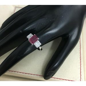 Anillo de Rubí Jewelspaark con Tres Piedras, Oro Blanco de 14K, Corte Esmeralda con Diamantes Baguette, Estilo Compromiso, Joyería Fina para Mujer - Product Image 1