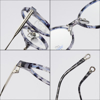 Gafas Unisex Ligeras con Marco de Metal TR90 Redondo Marmoleado, Lentes AC con Protección UV400 y Anti Luz Azul, para Hombre y Mujer