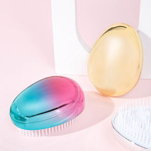 2024 nuova spazzola per parrucchieri a forma di uovo pettine per massaggio elettroplacca colorato uovo stellato per il lavaggio del pettine per capelli da donna - Product Image 5