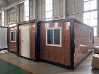 La maison à panneaux mobiles est une maison pliante de type aile, mobile et démontable, pour l'habitation.