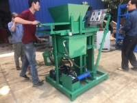 Machine de fabrication de briques à emboîtement en argile écologique XM2-25 ECO BRB Machine de fabrication de blocs d'argile automatique