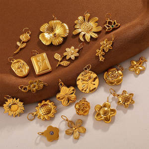 Colgantes y dijes de moda de acero inoxidable 316L chapados en oro PVD de 14K y 18K personalizados para hacer joyas, dijes de flores para pulseras. - Product Image 1
