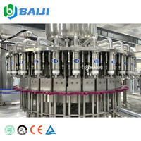 Ligne de production entièrement automatique de pasteurisation, d'embouteillage, de remplissage et de bouchage de jus de fruits en bouteilles PET