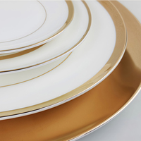Assiettes à dîner larges à bord doré pour mariage, ensemble d'assiettes de luxe en porcelaine fine dorée et blanche