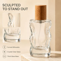 Flacon de parfum en verre sculpté de 50 ml avec bouchon en bois, conteneur vide pour vaporisateur de parfum, emballage personnalisé avec logo