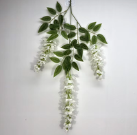 Vente en gros de fleurs artificielles en soie, glycine, pour décoration de mariage, fleurs murales, Noël, Pâques, vigne artificielle violette et verte