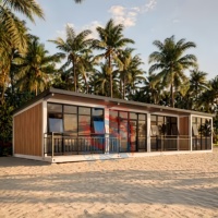 Maison conteneur modulaire préfabriquée et démontable avec un design moderne et respirant pour une maison de vacances écologique sur la plage