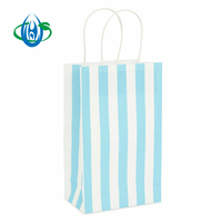 Sac en papier à emporter à rayures bleues et blanches avec sac en papier cadeau à poignée torsadée