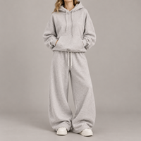 Ensemble de survêtement décontracté pour femme, personnalisé OEM, avec sweat à capuche et pantalon de survêtement à jambes larges, couleur unie, coupe oversize, fabricant de marque privée