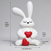 Grande sculpture de lapin en fibre de verre avec cœur rouge, statue de lapin en PRV pour extérieur, jardin, centre commercial, animal en fibre de verre