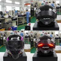 Casque de moto modulaire à double visière ABS de style nouveau avec lumières LED escamotables, haut-parleur intégré, homologué DOT, visière ouverte