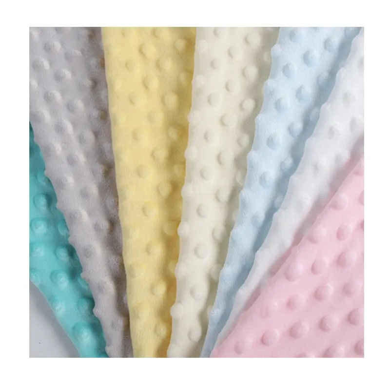 Fabrika kaynağı süper yumuşak Polyester battaniye polar katı kadife peluş Minky puantiyeli kumaş