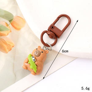 พวงกุญแจรถยนต์แบบโซ่ประดับลูกปัด ดีไซน์สร้างสรรค์ใหม่ ปี 2025  พร้อมกระเป๋าใส่หูฟังขนาดเล็ก  วัสดุหนังทนทาน - Product Image 4