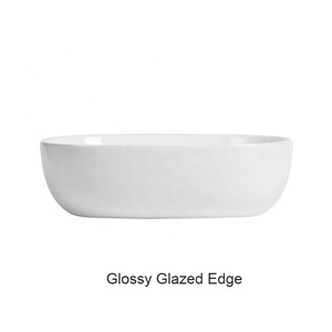 Lavabo en céramique à poser sur comptoir, facile à nettoyer, avec plateau intégré et drain dissimulé pour projets hôteliers - Product Image 2