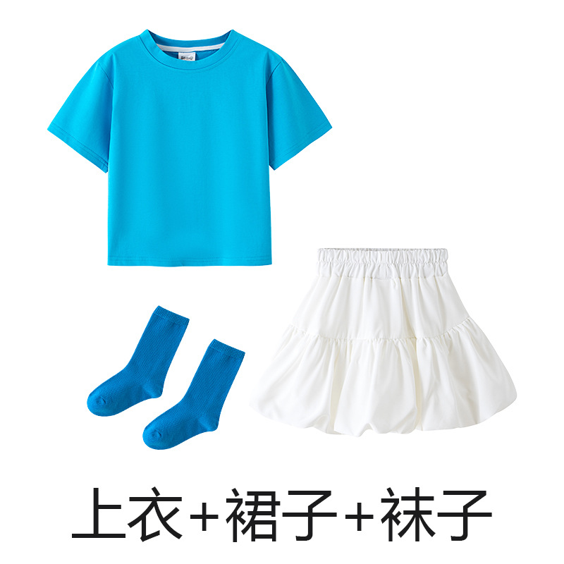 Blue T-shirt, white skirt, blue socks