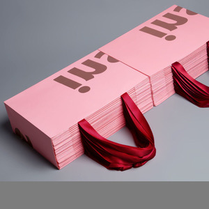 Luxury Pink Ribbon Shopping <strong>Paper</strong> <strong>Bag</strong> for Cosmetic Custom <strong>Logo</strong> <strong>Printed</strong> Hot Stamping Laser Bright Gold Quality Gift Packaging <strong>Bag</strong> - Product Image 1