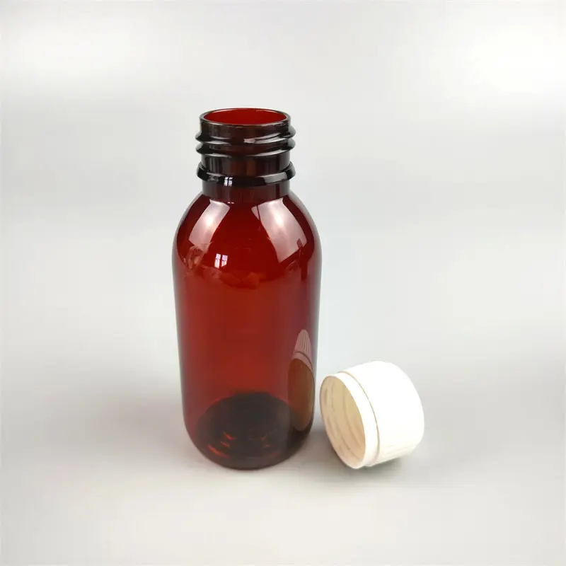 Botol sirup 100ml plastik dengan gelas ukur, botol obat cair bulat, wadah botol obat batuk sirup