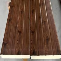 Porte de garage verticale pliante isolée sur mesure en acier galvanisé, pour usage résidentiel et showroom, modèle Crown