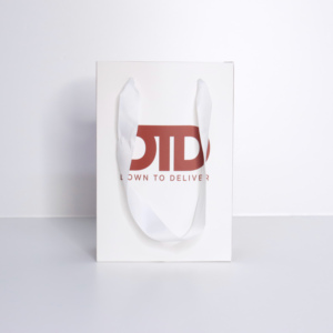 Custom Logo Luxury Style Kraft Paperboard Gift <b>Bags</b> Versatile <b>Packaging</b> <b>Clothing</b> Retail Ribbon Biodegradable Kraft Paper <b>Bag</b> - Product Image 1