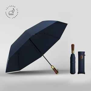 Cadeaux d'affaires <span class=keywords><strong>de</strong></span> marque moderne <span class=keywords><strong>haut</strong></span> <span class=keywords><strong>de</strong></span> <span class=keywords><strong>gamme</strong></span> <span class=keywords><strong>Parapluie</strong></span> pliant entièrement automatique Poignée en bois <span class=keywords><strong>de</strong></span> couleur unie <span class=keywords><strong>Parapluie</strong></span> <span class=keywords><strong>de</strong></span> qualité supérieure - Product Image 5