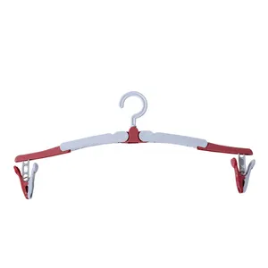 Durevole appendiabiti pieghevole in plastica da 38.5*15.5cm con gancio per pantaloni con clip staccabile appendiabiti sottile