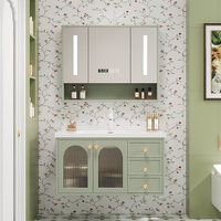 Ensemble de meuble-lavabo de salle de bain en bois de caoutchouc vert laqué de style français avec vasque en céramique intégrée, finition émaillée au four, miroir inclus