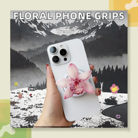 Poignée de téléphone pliable transparente à la mode avec prise en charge d'accessoires de support de téléphone portable magnétique de conception d'orchidée pour iPhone 16 15