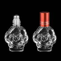 Bon prix, couleur personnalisée disponible, vente en gros, flacon vide en verre de 10 ml en forme de rose avec pompe à bille et bouchon