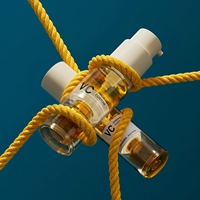 Flacon pompe airless de luxe 2-en-1 à double chambre, 30 ml, en PETG marron, pour sérum de soin et mélange de poudre lyophilisée