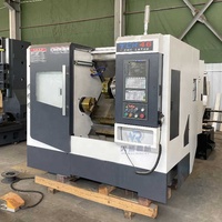 Tour CNC horizontal robuste TCK46 à banc incliné avec capacités de fraisage, perçage et tournage de haute qualité